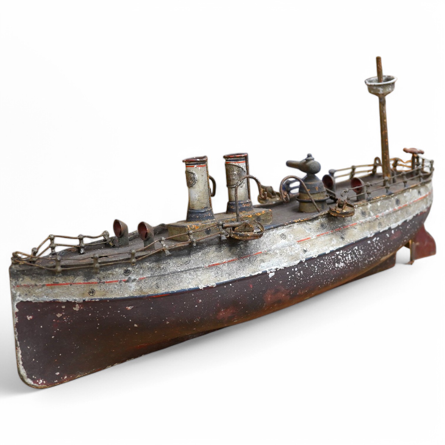 An Ernst Plank for Gamages Ltd clockwork tinplate gun-boat, 40cm in length. Condition - poor.